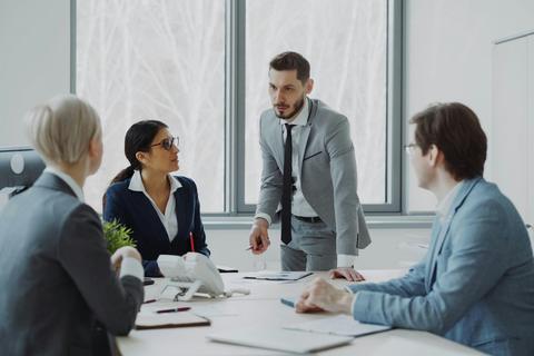 Leader guiding a team meeting