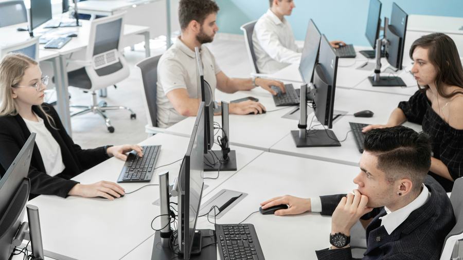 Students working at computers in class
