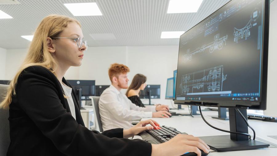 Student working at a desktop computer