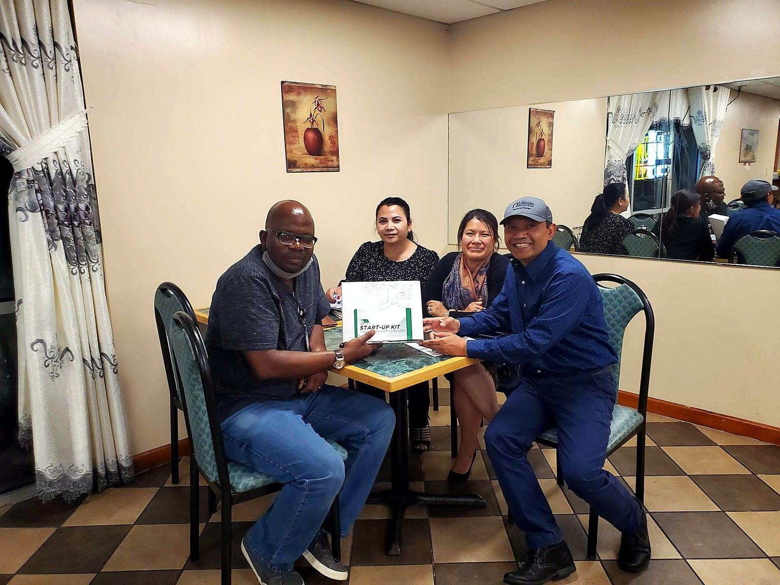Millionaire Club members at the table