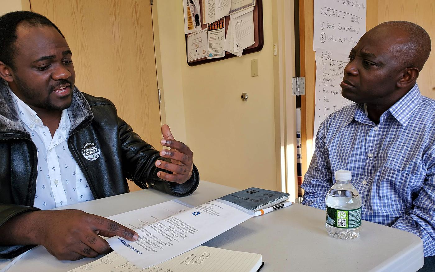 A SEEDS coach working one-on-one with a student