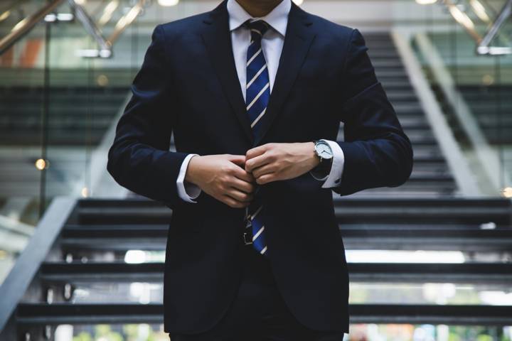 A franchise owner in a suit, ready for business